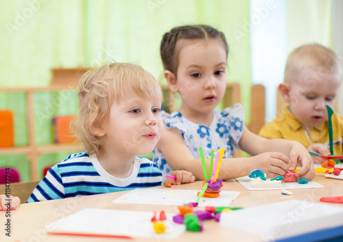kids doing arts and crafts in day care centre