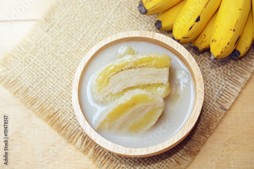 banana in coconut milk with ripe yellow banana. traditional thai dessert made from Pisang Awak banana