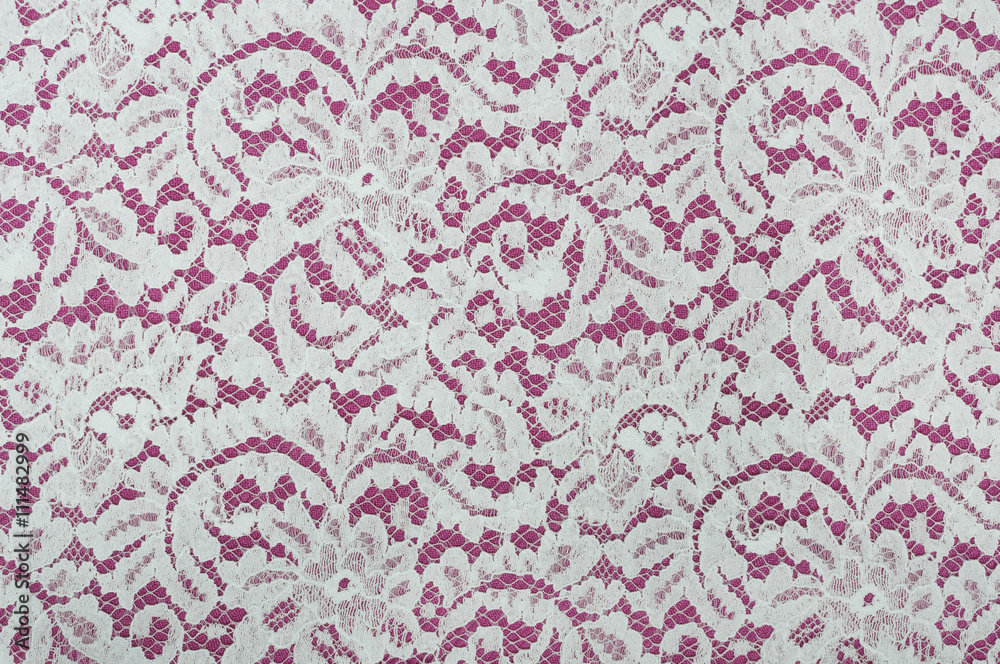 white lace fabric with floral pattern on red background