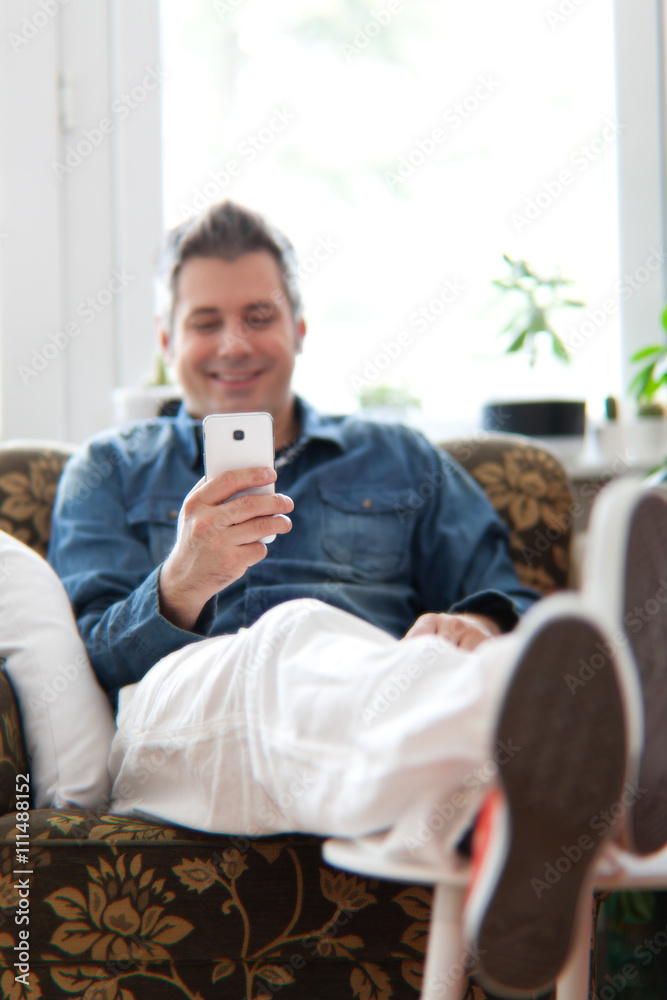 Young man using cell phone Young man using cell phone