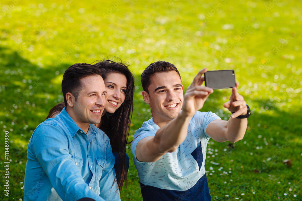 Young adults taking a selfie