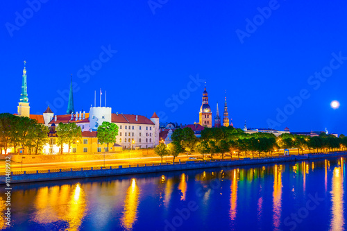 Old Town of Riga with reflection in Daugava River at night, Riga