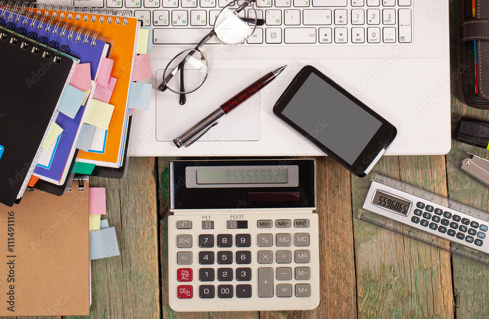 Business Objects office expanded in composition on a table Business Objects office expanded in composition on a table