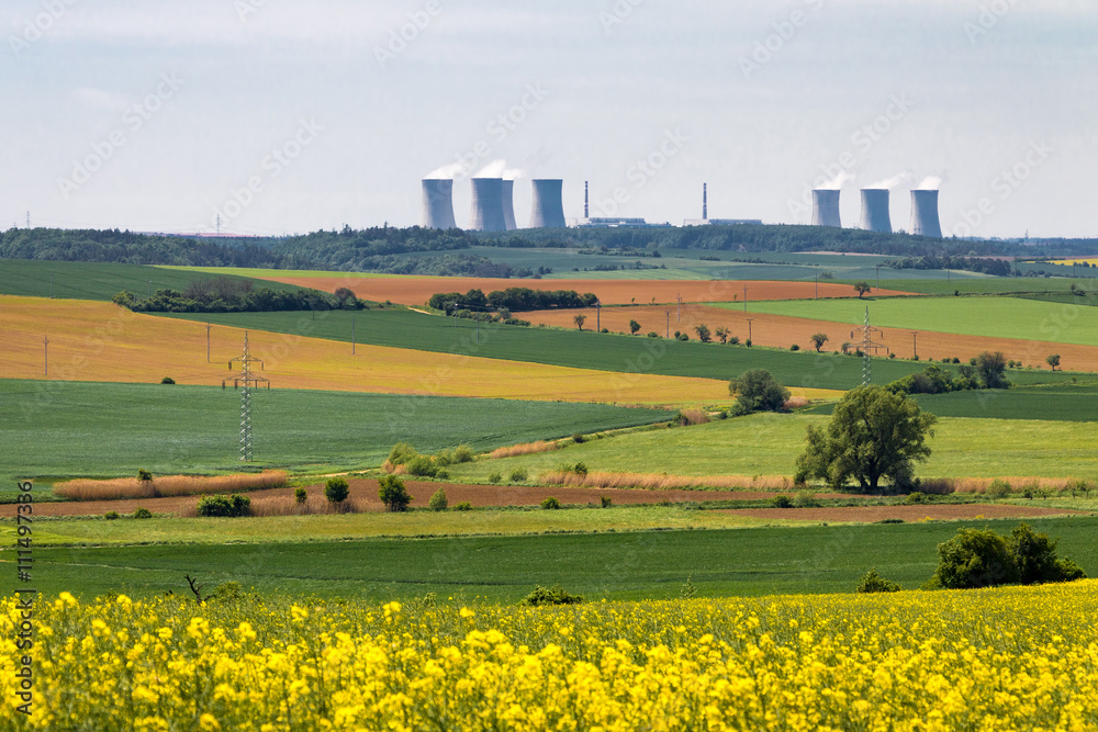 Nuclear power plant in spring countryside