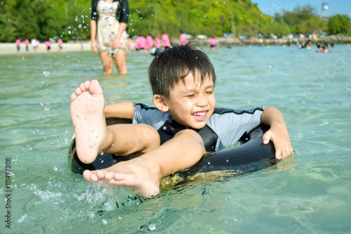 The boys are happy and fun to see the ocean for the first time.