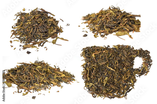 pile of dried tea leaves and dried tea leaves cup isolate on white background