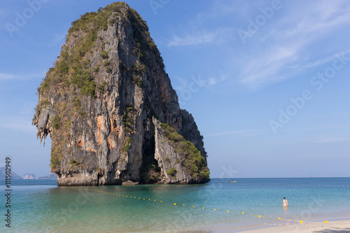 girl floats on Phra Nang beach in Krabi  Thailand