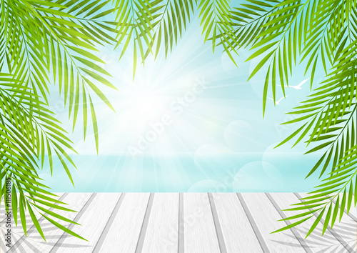 Summer background with palm leaves 