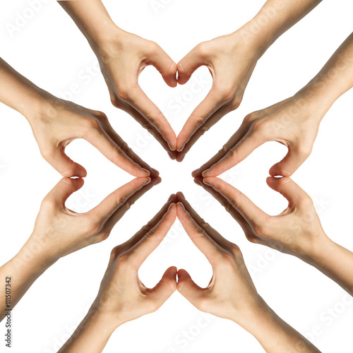 pattern where girl's hands serried in a heart shape on isolated background photo