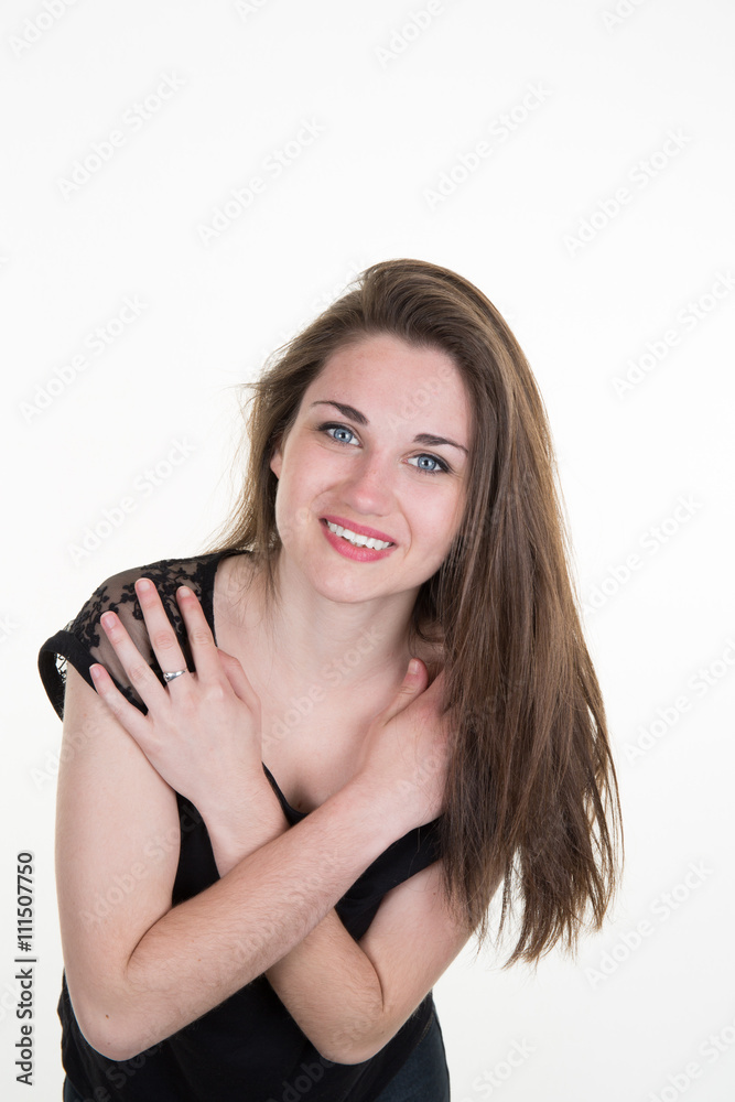 Fototapeta premium Young girl looking at camera with a smile