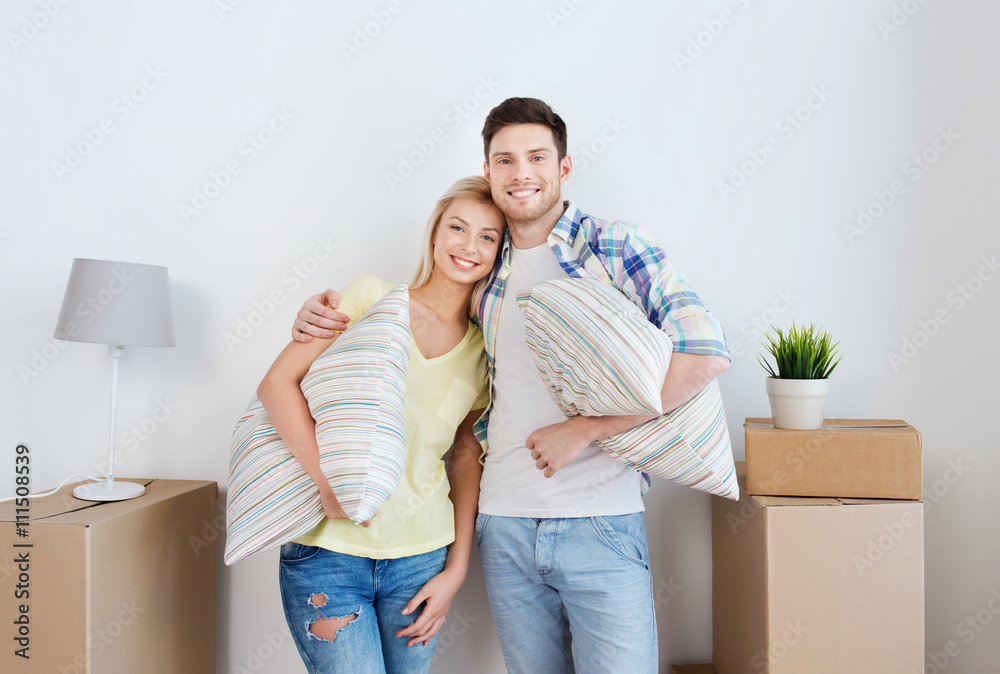 happy couple with stuff moving to new home happy couple with stuff moving to new home