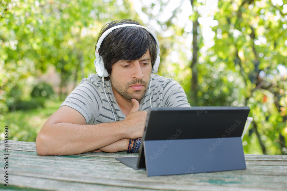 man working with tablet pc man working with tablet pc
