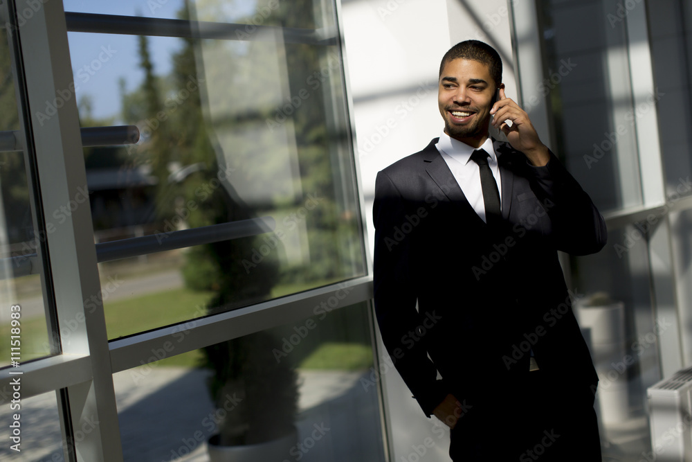Businessman on a phone in the office Businessman on a phone in the office