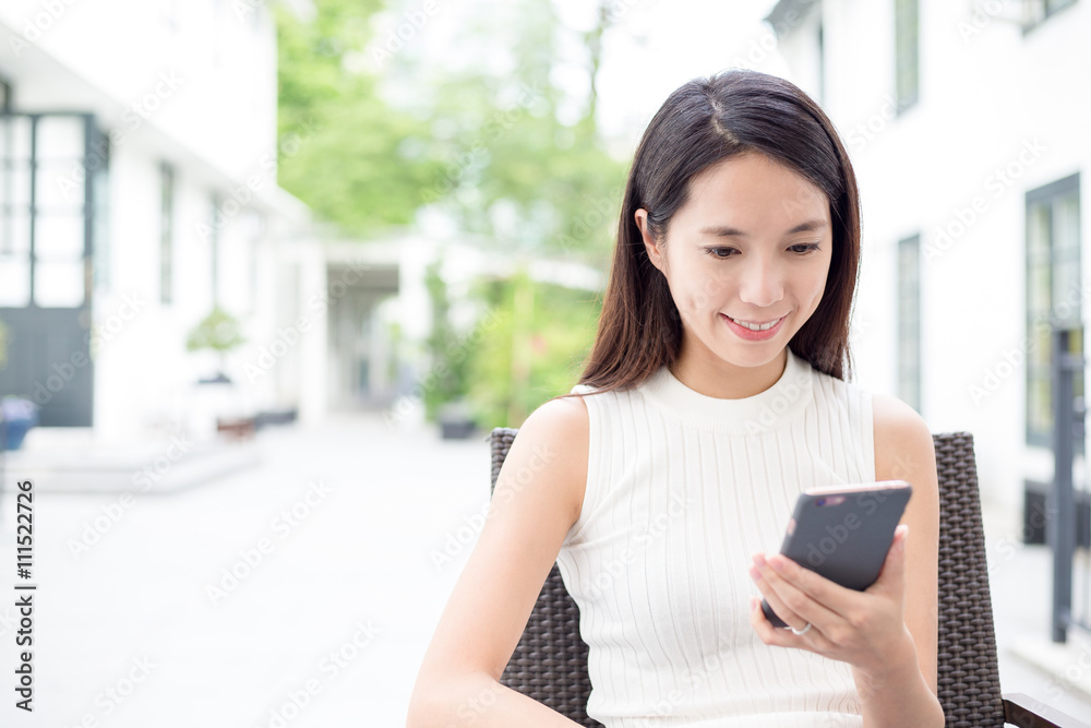 Woman using cellphone Woman using cellphone