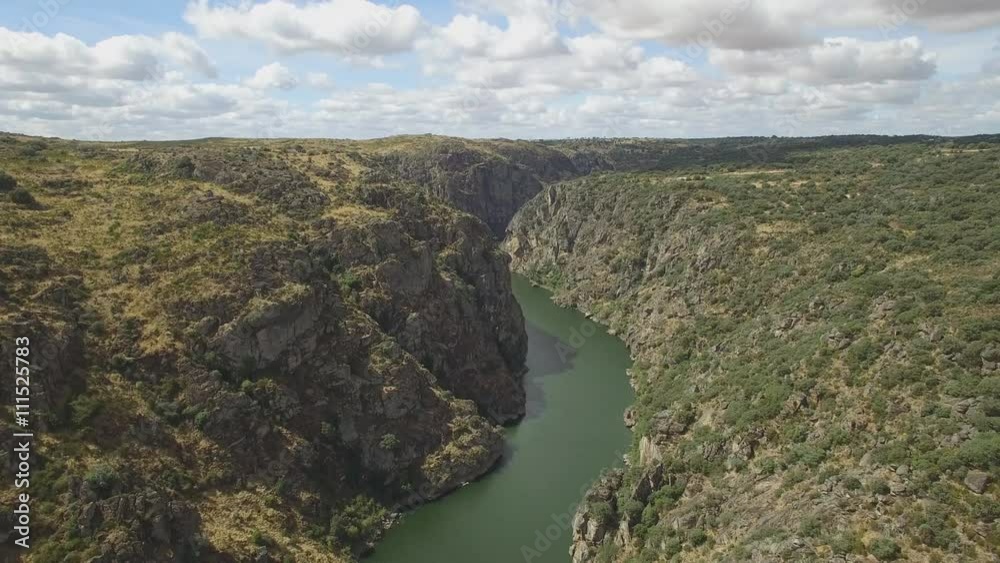 Aerial view approaching the edge of a cliff Aerial view approaching the edge of a cliff
