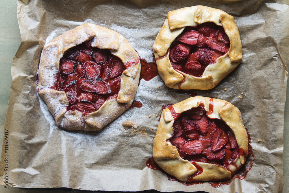 Preparing pastry for cooking sweet bakery, strawberry galette