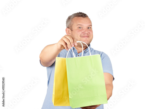 Obraz na płótnie Caucasian man fat,  with colorful shopping paper bags