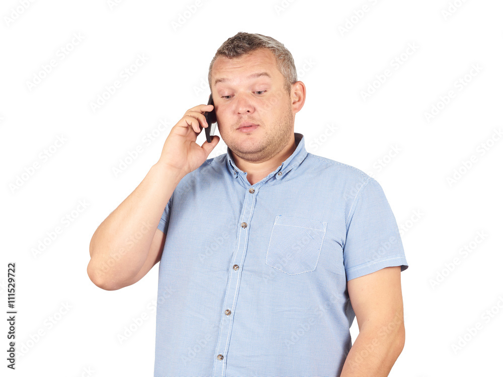 Fat businessman talking on the phone. Fat businessman talking on the phone.