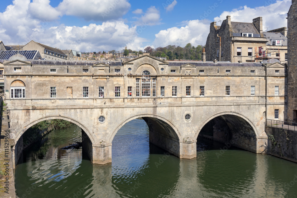 The historic Pultney Bridge in Bath on a warm spring day