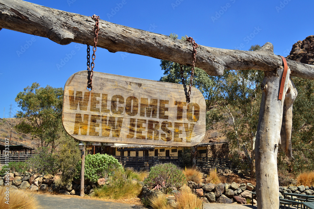 old wood signboard with text " to new jersey" hanging on a