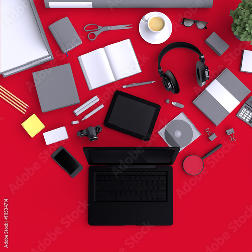 Laptop with variety blank office objects.