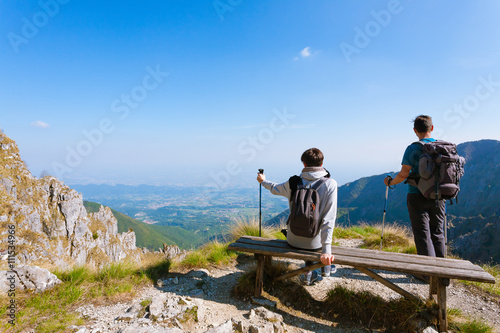 Young couple on top of a mountain