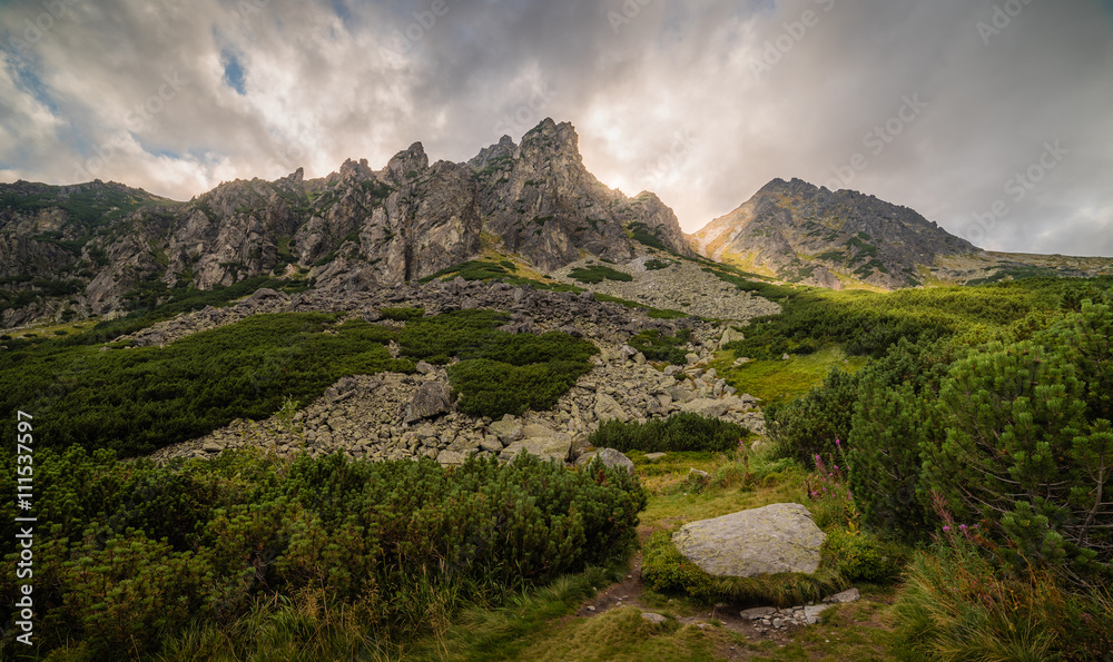 Fototapeta premium Mountain Landscape with Dramatic Glowing Sky. Mlynicka Valley, High Tatra, Slovakia.