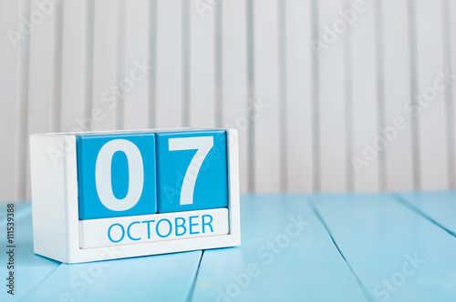 October 7th. Image of October 7 wooden color calendar on white background. Autumn day. Empty space for text