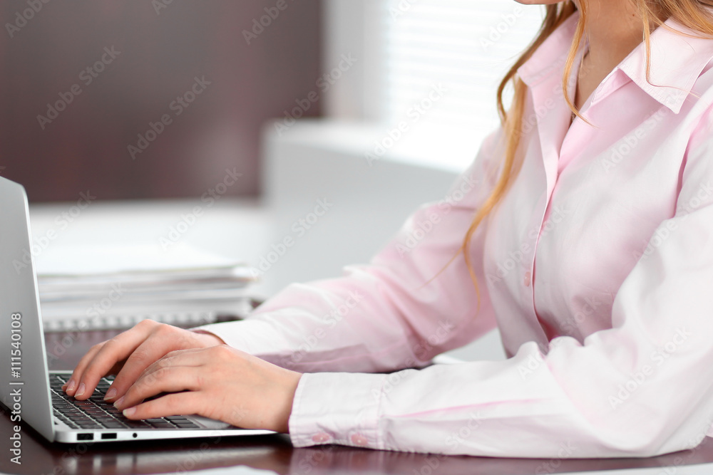Close up of business woman hands typing on laptop computer Close up of business woman hands typing on laptop computer