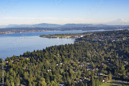 Aerial Shot of Forests, Lake, and Suburban Neighborhoods of Shoreline, Sand Point, North Seattle, Magnuson Park, Lake Washington, and Mt Rainier © CascadeCreatives