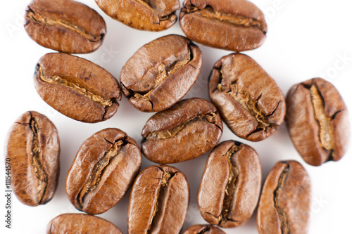 Roasted coffee beans isolated in white background cutout