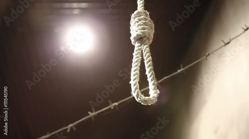 Gibbet and barbed wire in concentration camp. Hanging