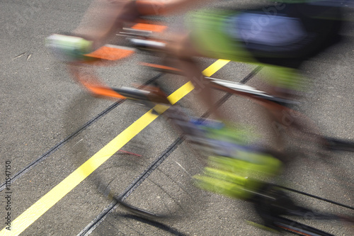 Cyclist reaching the goal line competing on a race