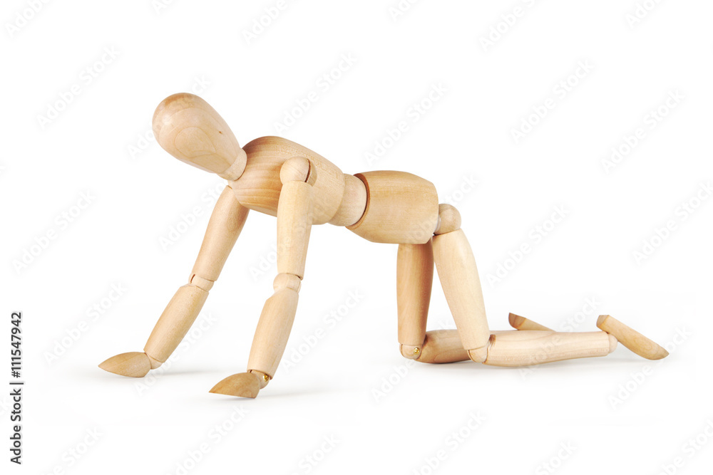 Man crawls on his knees isolated over white background. Abstract image with a wooden puppet Man crawls on his knees isolated over white background. Abstract image with a wooden puppet