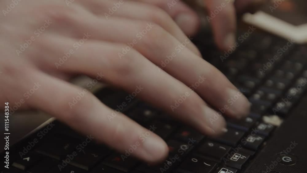Boy using black keyboard of notebook. Broken keys. Writing text. Device. Moving. Tapping. Close up Boy using black keyboard of notebook. Broken keys. Writing text. Device. Moving. Tapping. Close up
