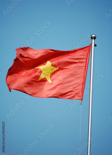 National flag of Vietnam on the sky background 