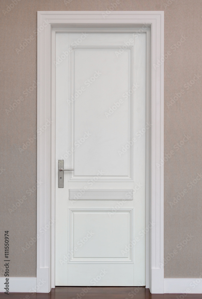 closed white door on brown background closed white door on brown background