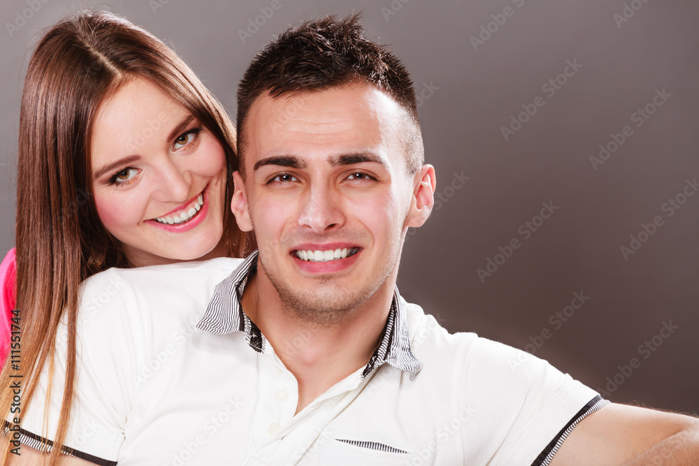 Portrait of smiling woman and man. Happy couple.