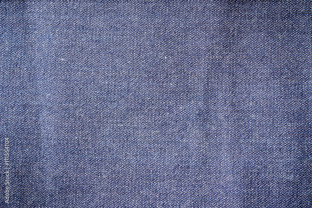 Blue denim jeans closed up texture.