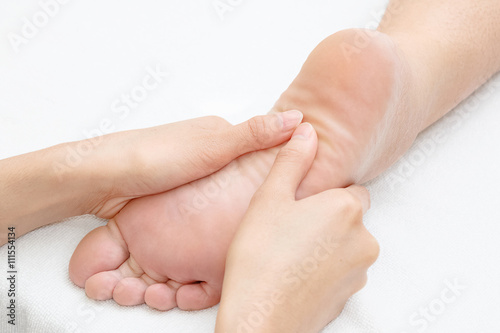 Reflexology foot massage in the day spa