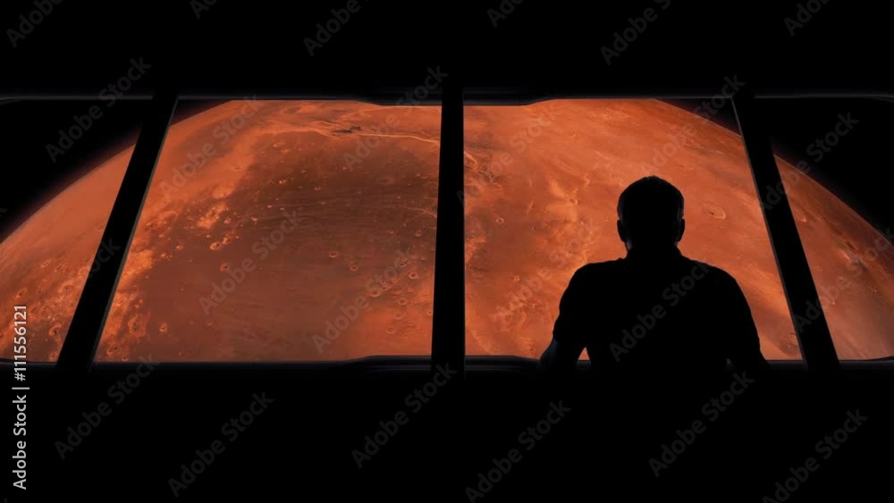 Astronaut Looks At Mars From Shuttle