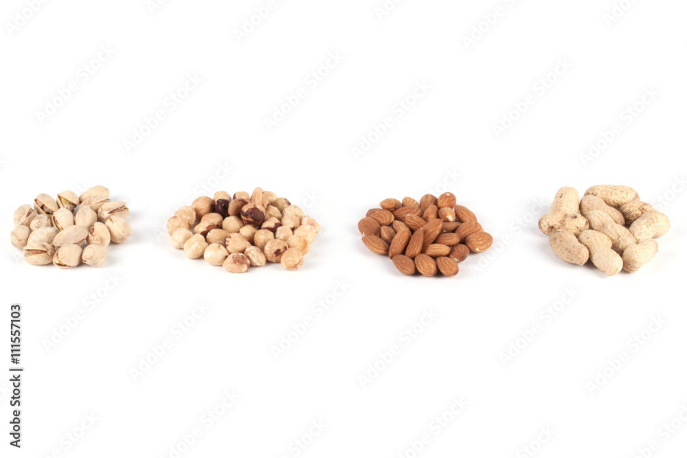 Various kinds of nuts on a white background. Various kinds of nuts on a white background.