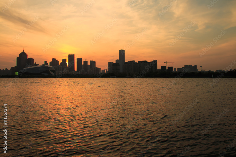 China's Shenyang city building at sunset