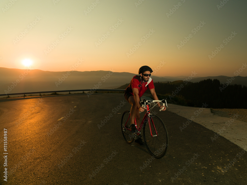Fototapeta premium cyclist on road bike