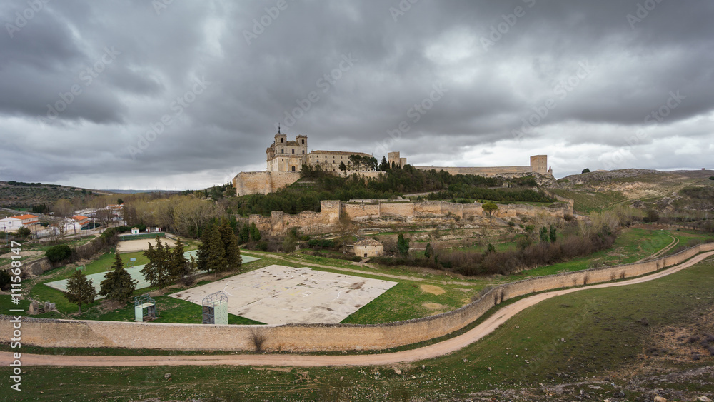 Monastery at Ucles, Castilla la Mancha, Spain. cloudy sky