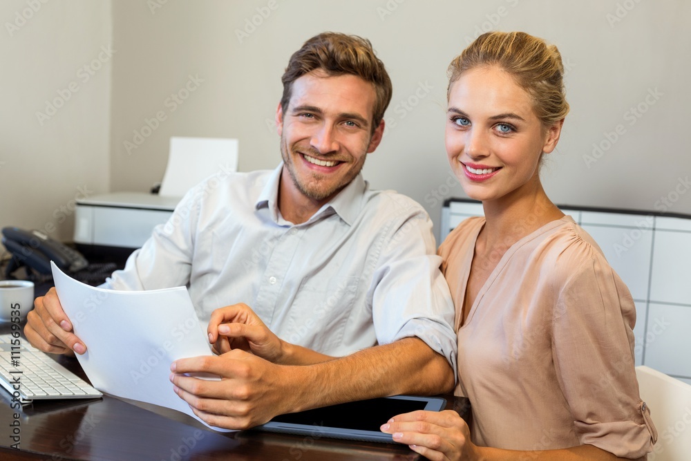 Obraz premium Portrait of smiling colleagues in office