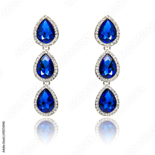 Pair of sapphire earrings isolated on white 