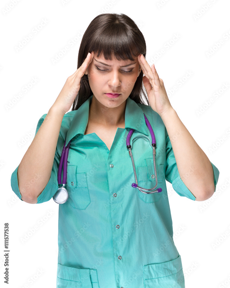 Female doctor tired with headache isolated on white Female doctor tired with headache isolated on white
