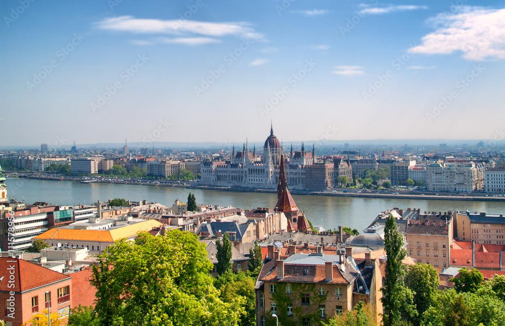 Hungarian parliament in budapest and Danube river on a bright sunny day