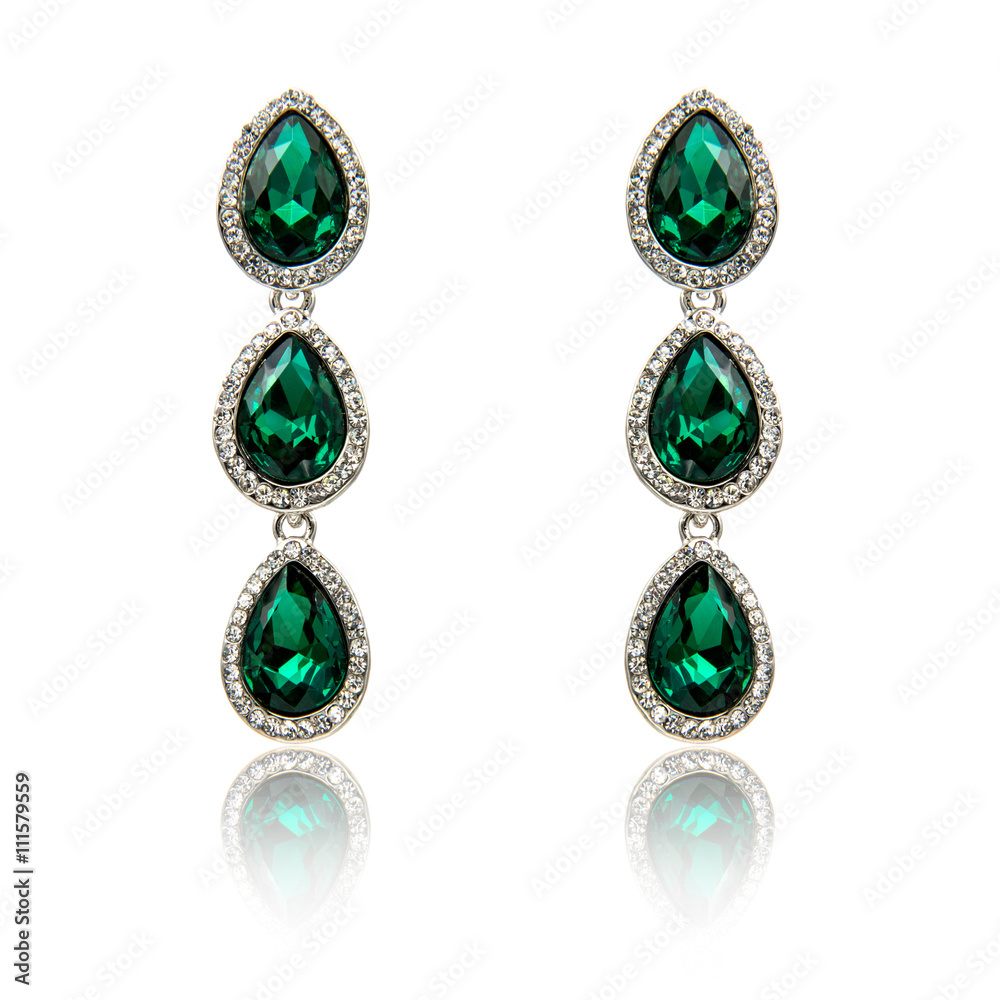 Pair of emerald earrings isolated on white
Pair of emerald earrings isolated on white